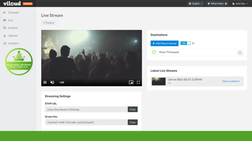 Screenshot of a live streaming platform showing a video of a live concert. The interface includes streaming settings, destinations, and a list of latest live streams, featuring Viloud 2024 for creating your Custom Online TV Channel.