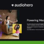 A woman with headphones sings into a microphone at home, while a young boy listens attentively. Text about AudioHero's royalty free music services is displayed, highlighting its vast collection. Neon musical symbols glow on the wall, adding ambiance to the perfect setting for artistic expression.