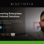DiscTopia webpage showcasing a man on the right, emphasizing "Empowering Enterprises with Tailored Solutions" with a call-to-action button for a free start.